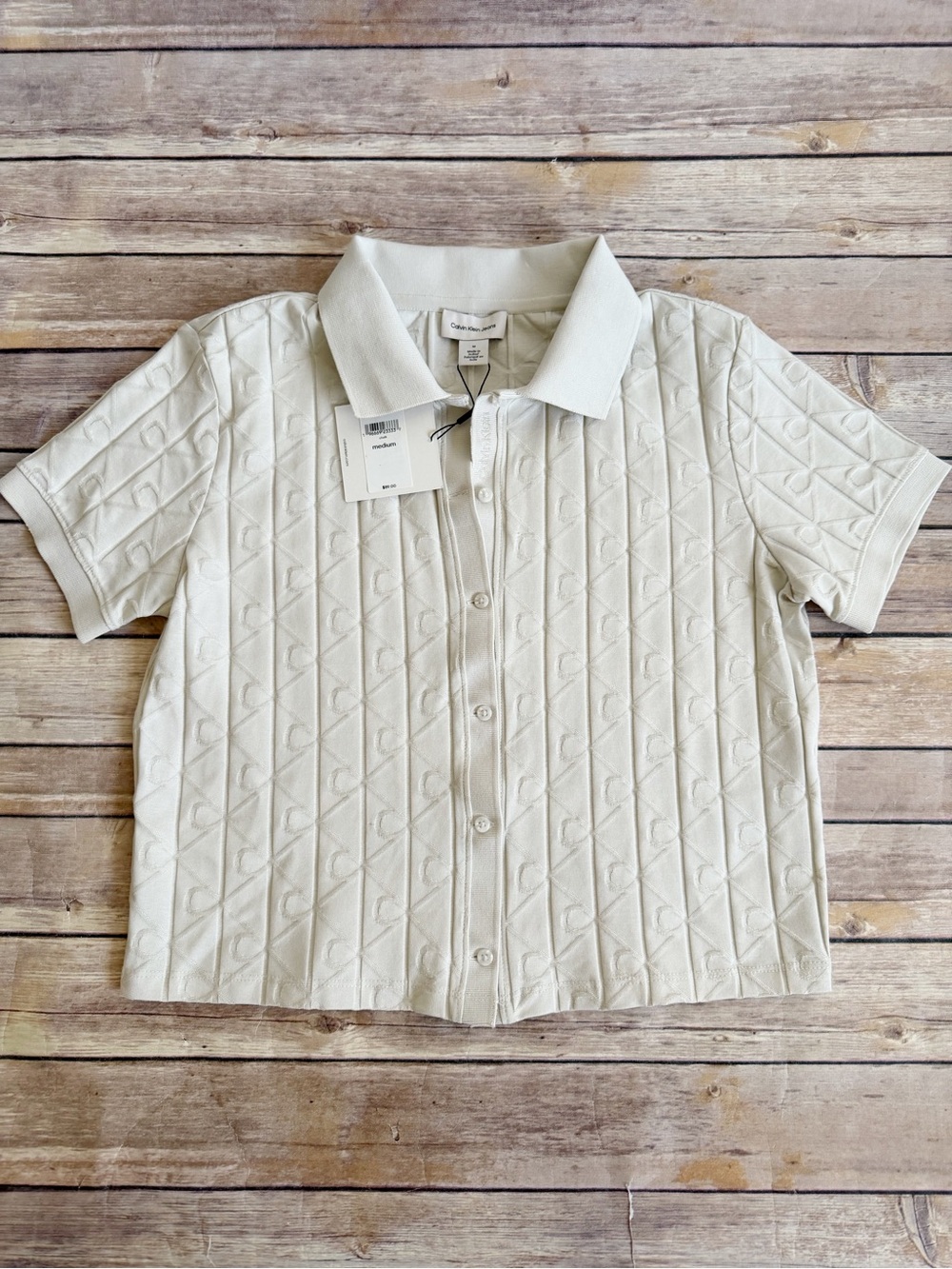 Calvin Klein Jeans Women’s Short sleeve polo style button-up knit top chalk M